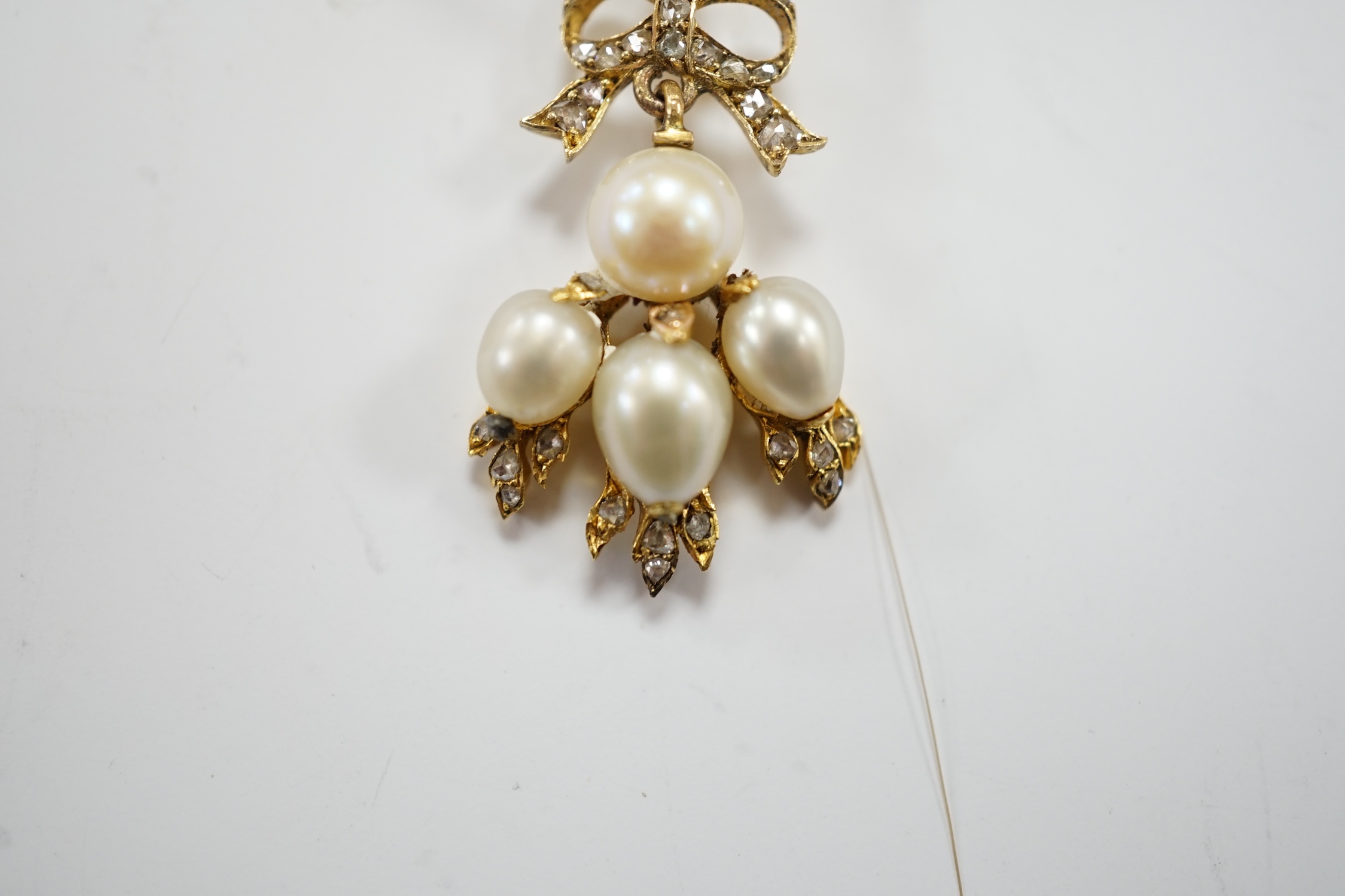 A yellow metal, cultured pearl and rose cut diamond cluster set drop pendant, 34mm, gross weight 3.4 grams.